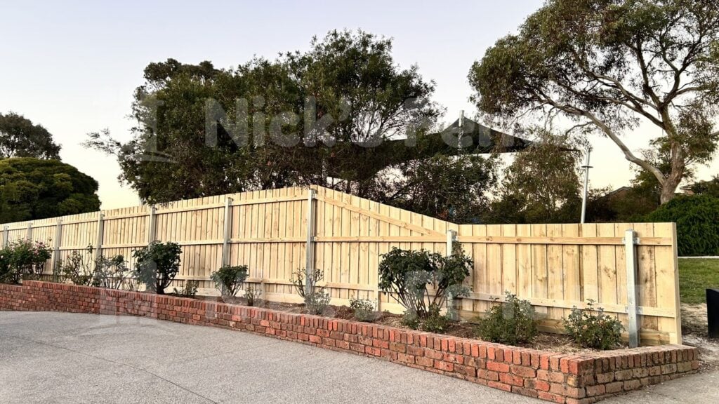 timber boundary fence with steel posts